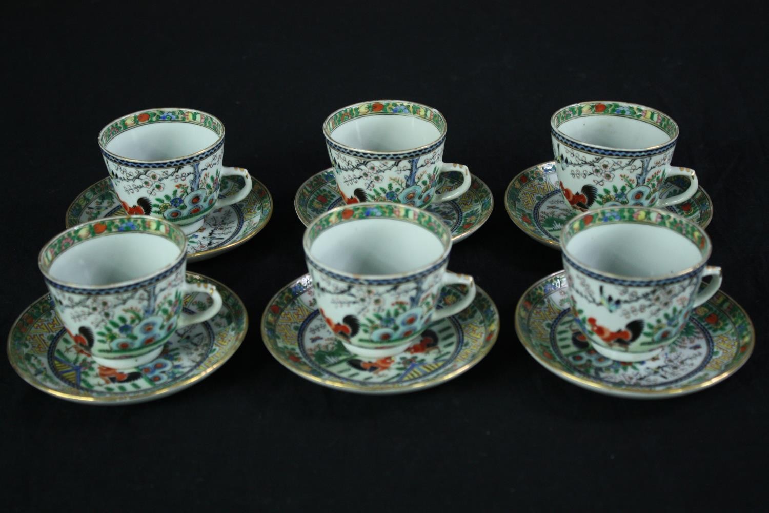 A set of tea cups and saucers. 'Made in China' probably for the export market. Hand painted and - Image 9 of 11