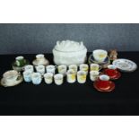 A large collection of mixed pottery. Including tea and coffee cups, plates and a lidded pot. Made by