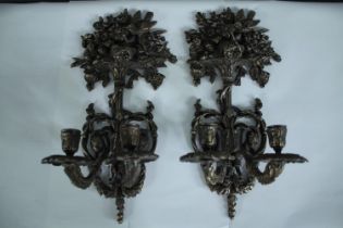A pair of brass sconce candle holders. H.37 W.17 cm. (each)