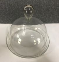 A 19th century lidded hand blown glass cake stand. H.17 Dia. 18cm.