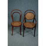 Two children's bentwood chairs with caned seats. Thonet stamp to the armchair. H.69cm.