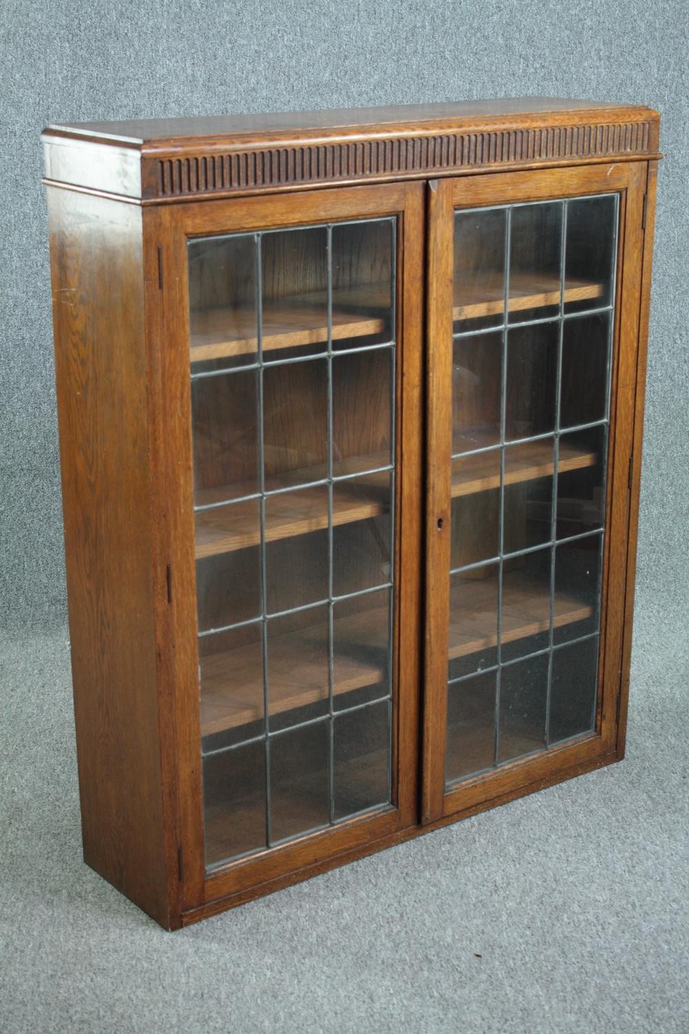 Bookcase, mid century oak with leaded glass doors. H.110 W.90 D.27cm. - Image 2 of 5