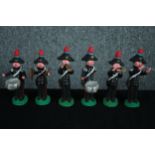 A regimental marching band. Clay figures. Hand painted. Twentieth century.H.13 cm. (largest)