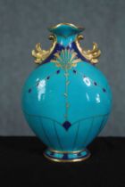 Minton's pottery. An ornate blue teal vase with hand painted gilt decoration. Egyptian revival.