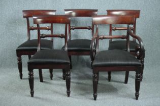Dining chairs, a set of five late Georgian mahogany to include a carver armchair.