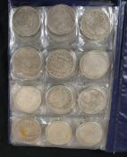 Sixty nine assorted white metal world coins to include Mexico, United States of American, Ghana