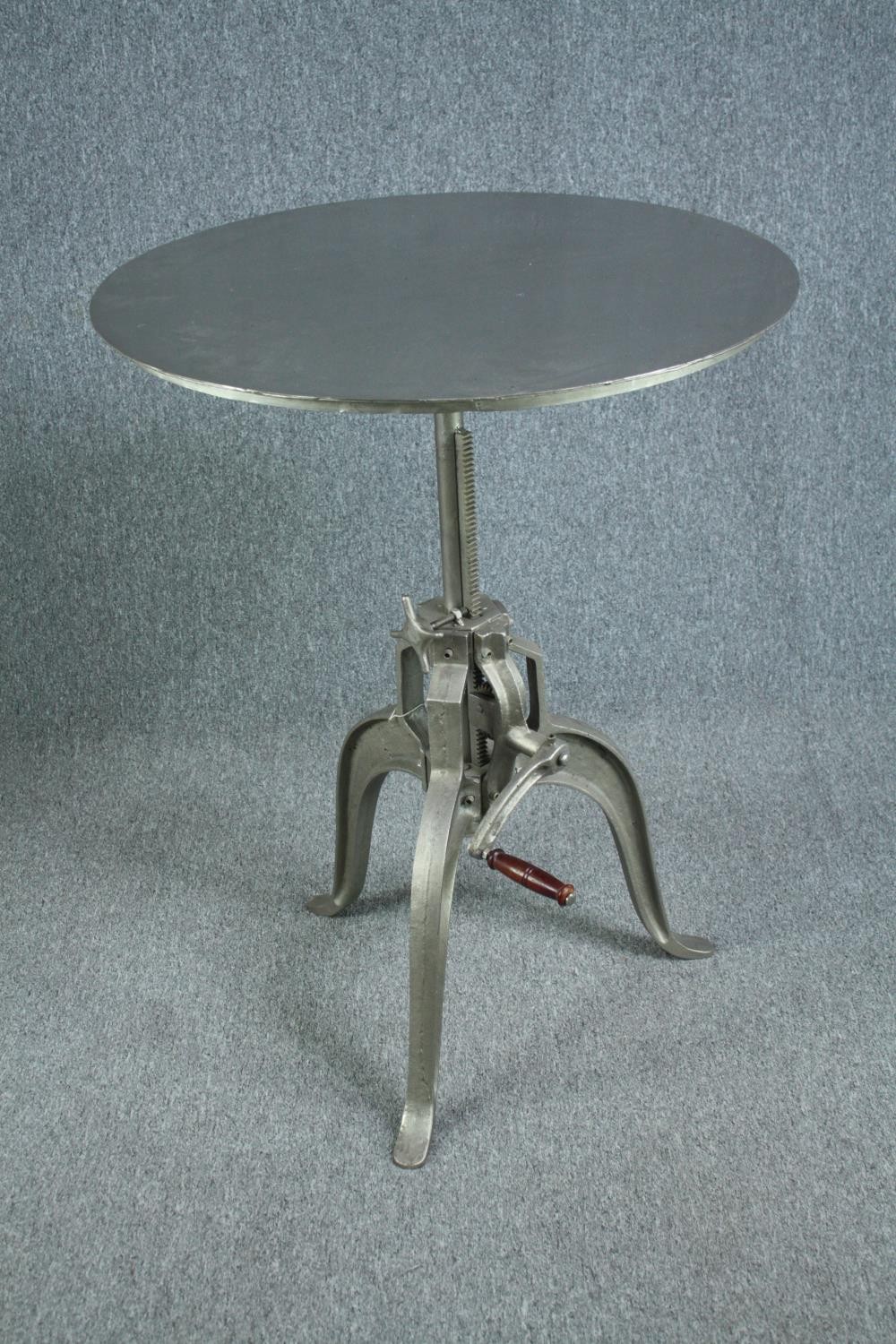 A metal industrial style table with hand winding rise and fall action. Dia.77cm. - Image 5 of 7