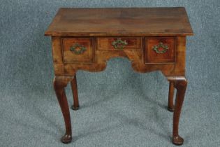 Lowboy, mid Georgian figured walnut and satinwood inlaid. H.70 W.78 D.49cm.