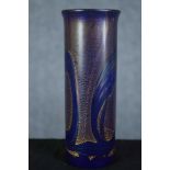 A blue glass oil slick vase with a gilt finish. Maybe Isle of White studio glass but without a