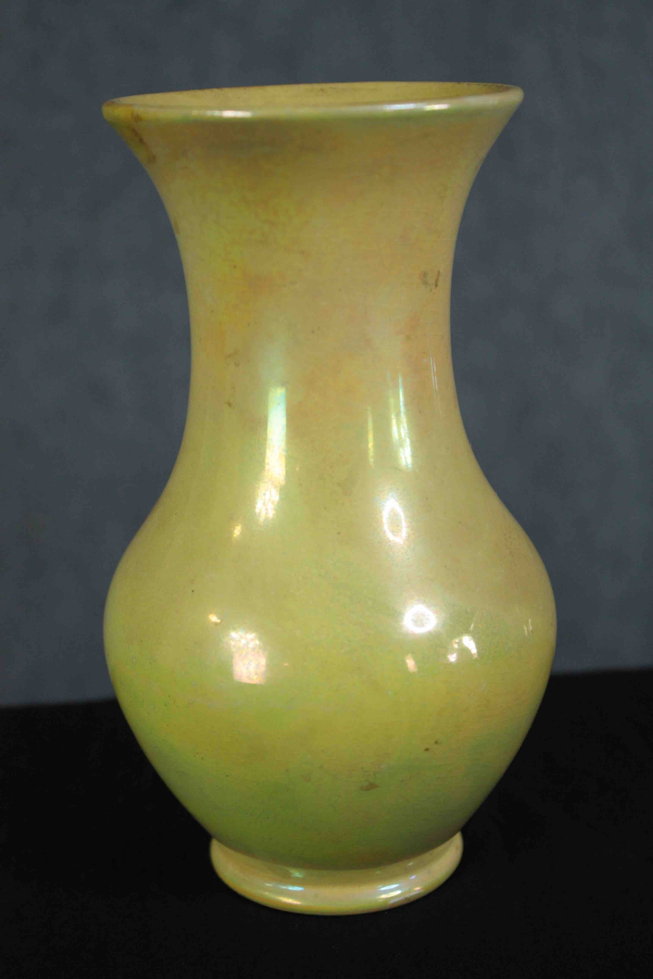 Moorcroft pottery yellow lustre. Stamped 'Moorcroft Burslem M49' on the base'. Circa 1920. H.17 cm.