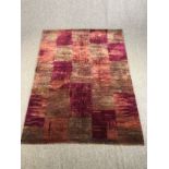 A hand woven carpet with allover geometric pattern. L.260 W.190cm.