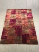 A hand woven carpet with allover geometric pattern. L.260 W.190cm.