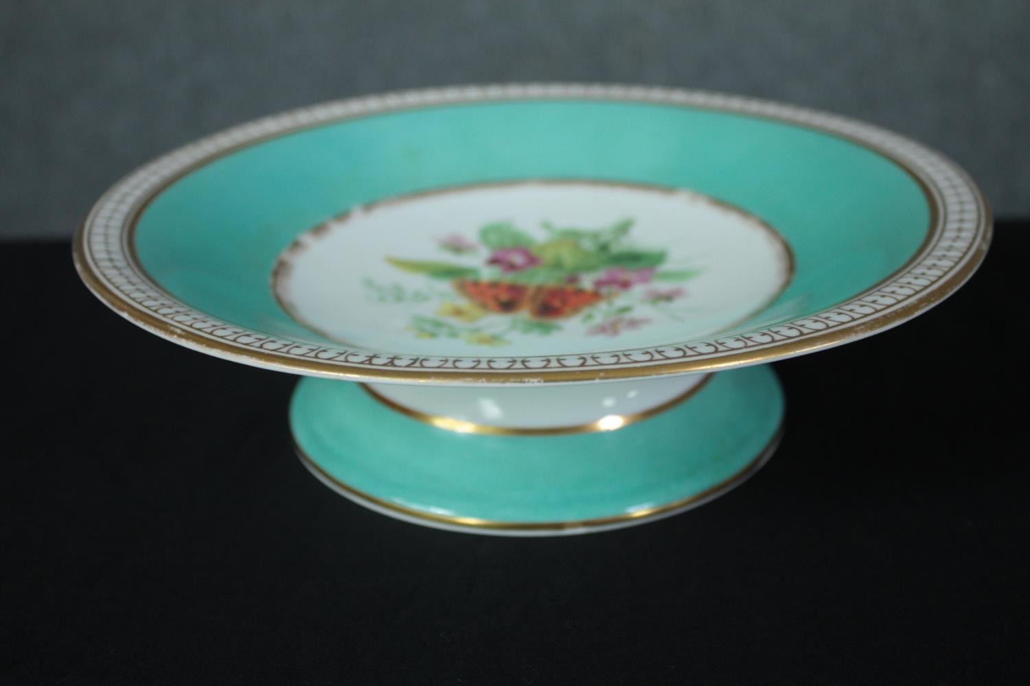 A set of nineteenth century hand painted plates with gilt edging and flowers at the centre. Includes - Image 2 of 8