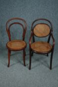 Two children's bentwood chairs with caned seats. Thonet stamp to the armchair. H.69cm.