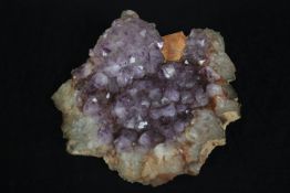 A large piece of amethyst crystal. H.10 W.26 D.20cm.