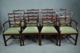 A set of eight Georgian style mahogany ladder back dining chairs, to include two carver armchairs.