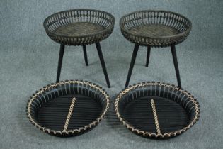 A pair of woven and wicker tray tables and a similar pair of trays. H.54 Dia.57cm. (largest)