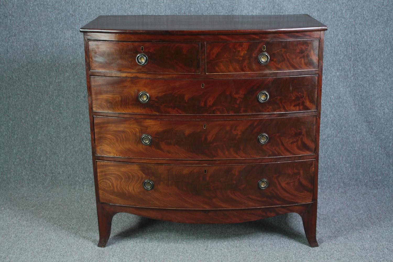 Chest of drawers, Georgian flame mahogany bowfronted. H.104 W.105 D.54cm.
