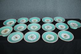 A set of nineteenth century hand painted plates with gilt edging and flowers at the centre. Includes