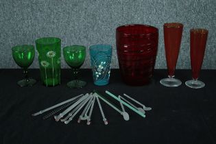 A mixed collection of coloured studio glass including, glass straws, stirrers, cup and a vase. H.
