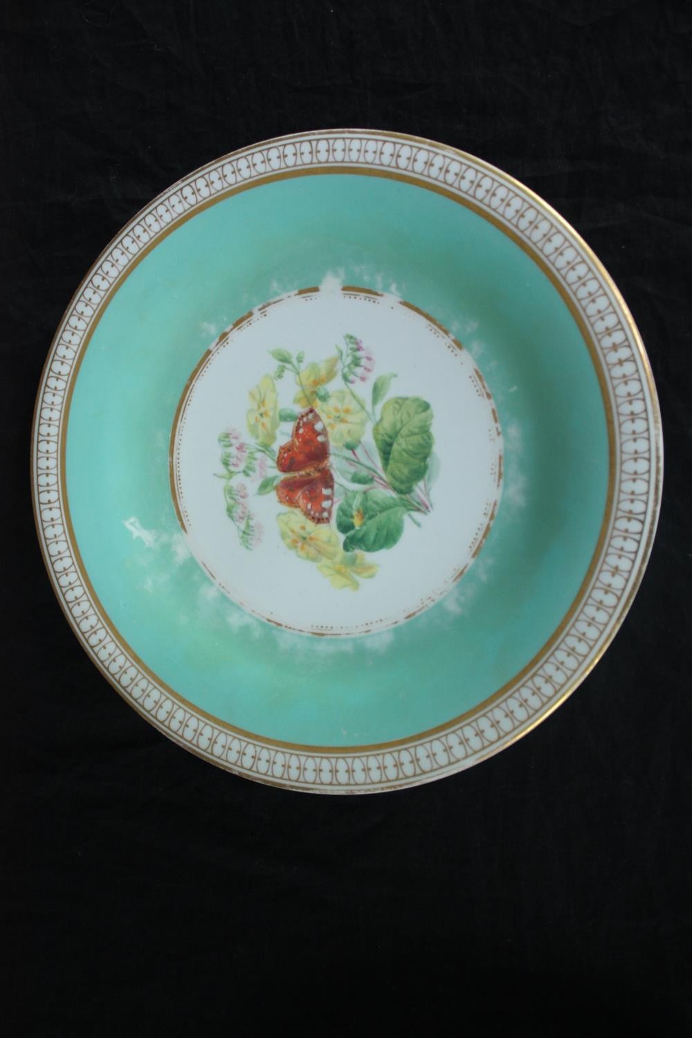 A set of nineteenth century hand painted plates with gilt edging and flowers at the centre. Includes - Image 6 of 8