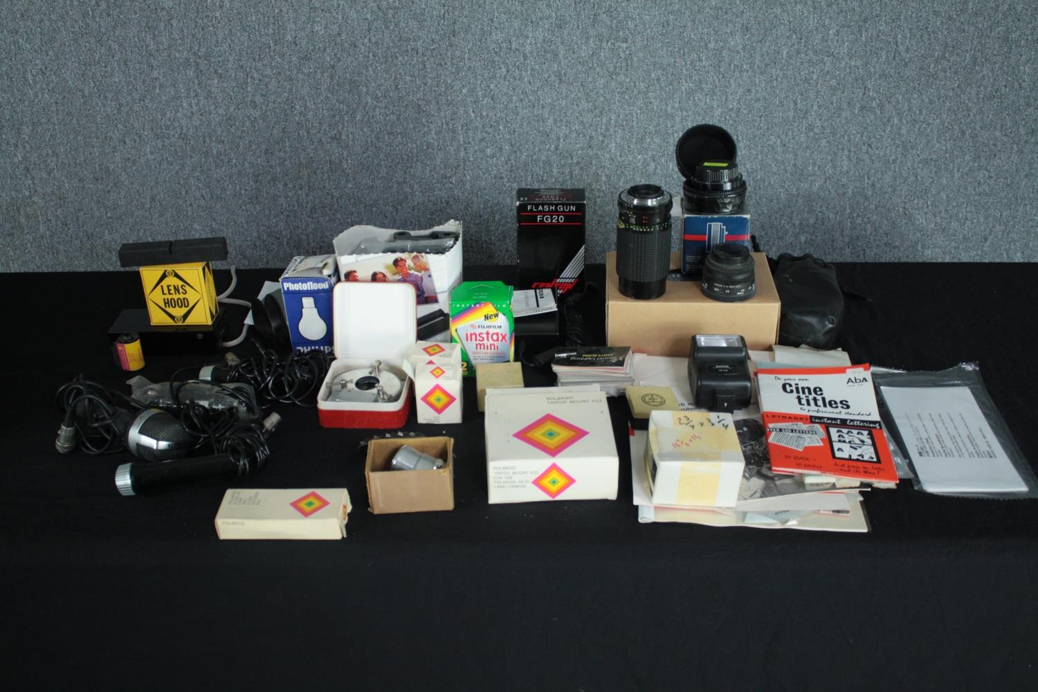 A collection of vintage camera, sound and printing equipment.