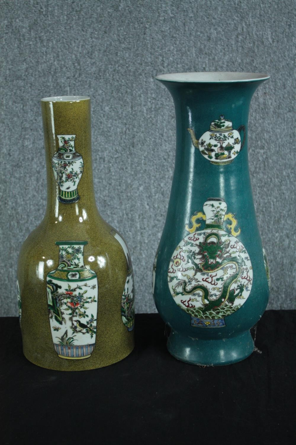 Two Chinese vases. Signed on the base with the artist's seal and decorated with Chinese porcelain