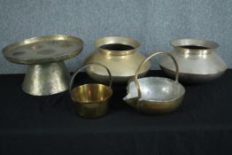 A collection of five metal items including a stand, vases, pots and a brass pan. Twentieth