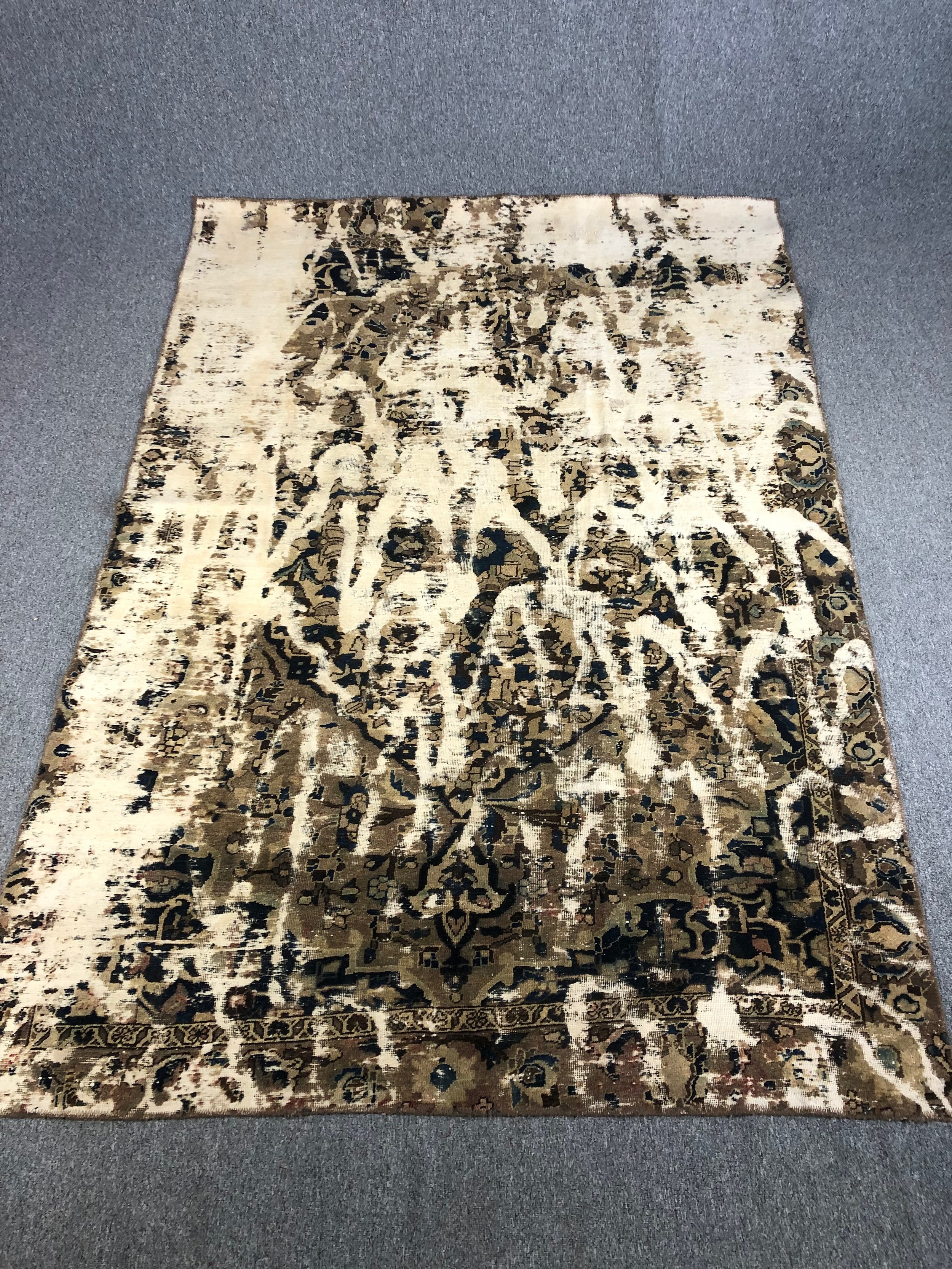 A hand made Eastern carpet, faux distressed. L.280 W.195cm.