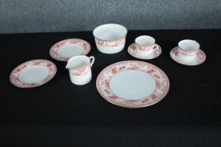 Wedgwood cups and saucers. A mixed collection made up of a creamer, sugar pot, side plates and
