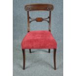 Dining chair, Regency mahogany on sabre supports.