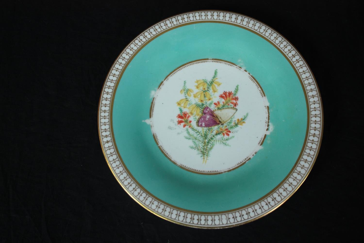 A set of nineteenth century hand painted plates with gilt edging and flowers at the centre. Includes - Image 4 of 8