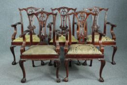A set of five Chippendale style mahogany carver armchairs.