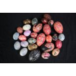 A collection of Czech Kraslice eggs. Hand painted with intricate patterns. H.9 cm. (largest)