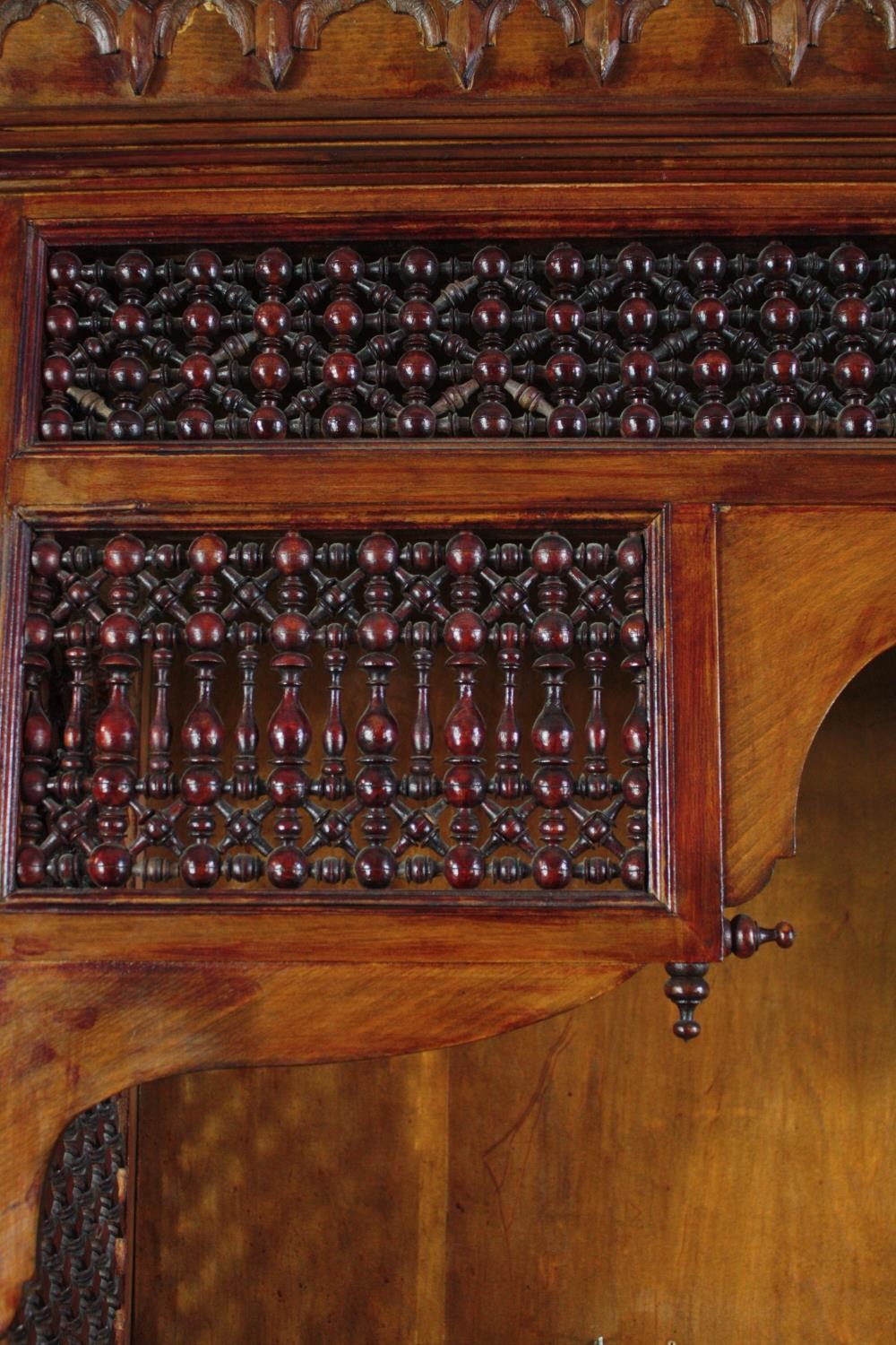 A North African style carved hardwood bookcase section. H.137 W.121 D.38cm. - Image 4 of 5