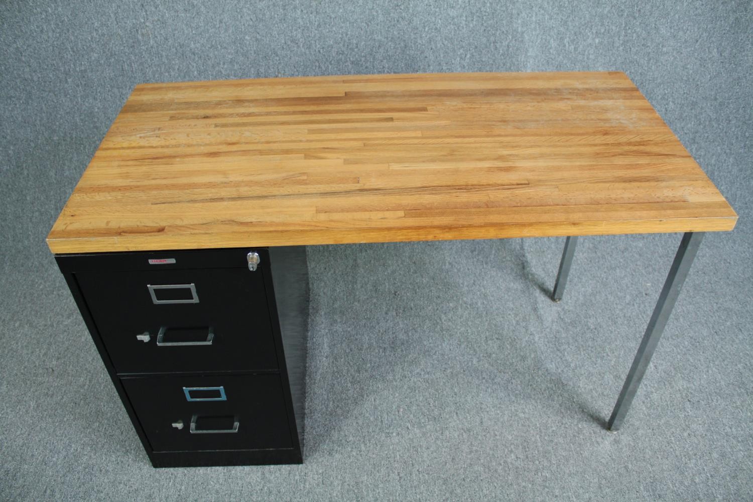 A vintage oak topped desk with filing cabinet pedestal and maker's label. H.75 W.122 D.61cm. - Image 5 of 6