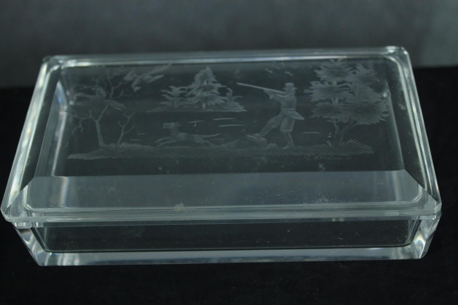 A collection of etched glass including a vase and three lidded glass boxes decorated with a shooting - Image 7 of 11