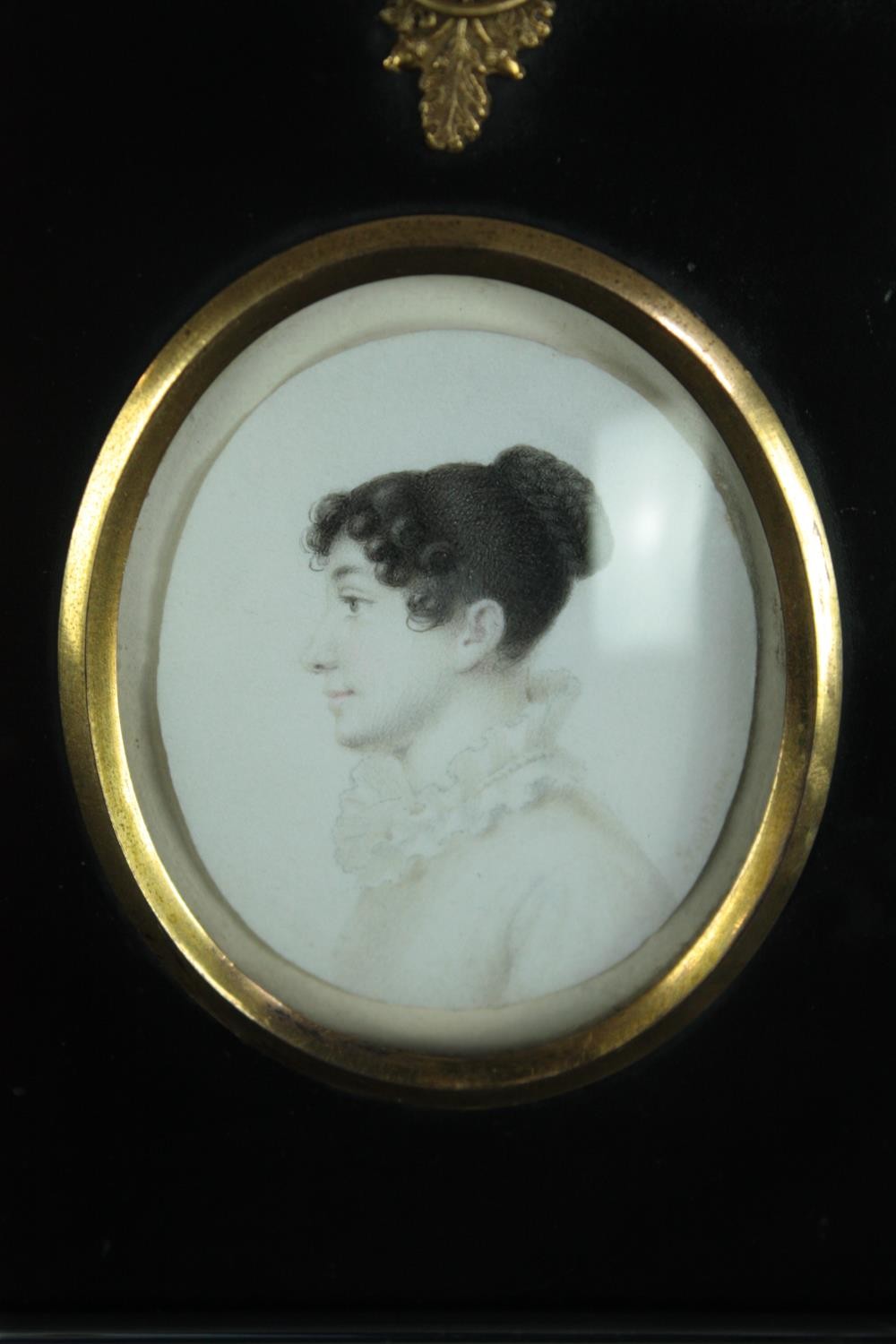 Two miniature printed portraits in ebonised frames. The gilt frame with a glass stand. H.14cm. ( - Image 3 of 5