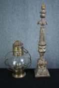 A decorative resin desk lamp and a glass cased candle holder with a brass base and lid. H.64 cm (