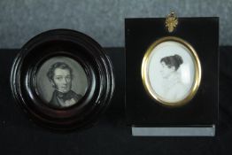 Two miniature printed portraits in ebonised frames. The gilt frame with a glass stand. H.14cm. (