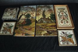 A collection of tiles including two hand painted landscapes. Two are framed together and another