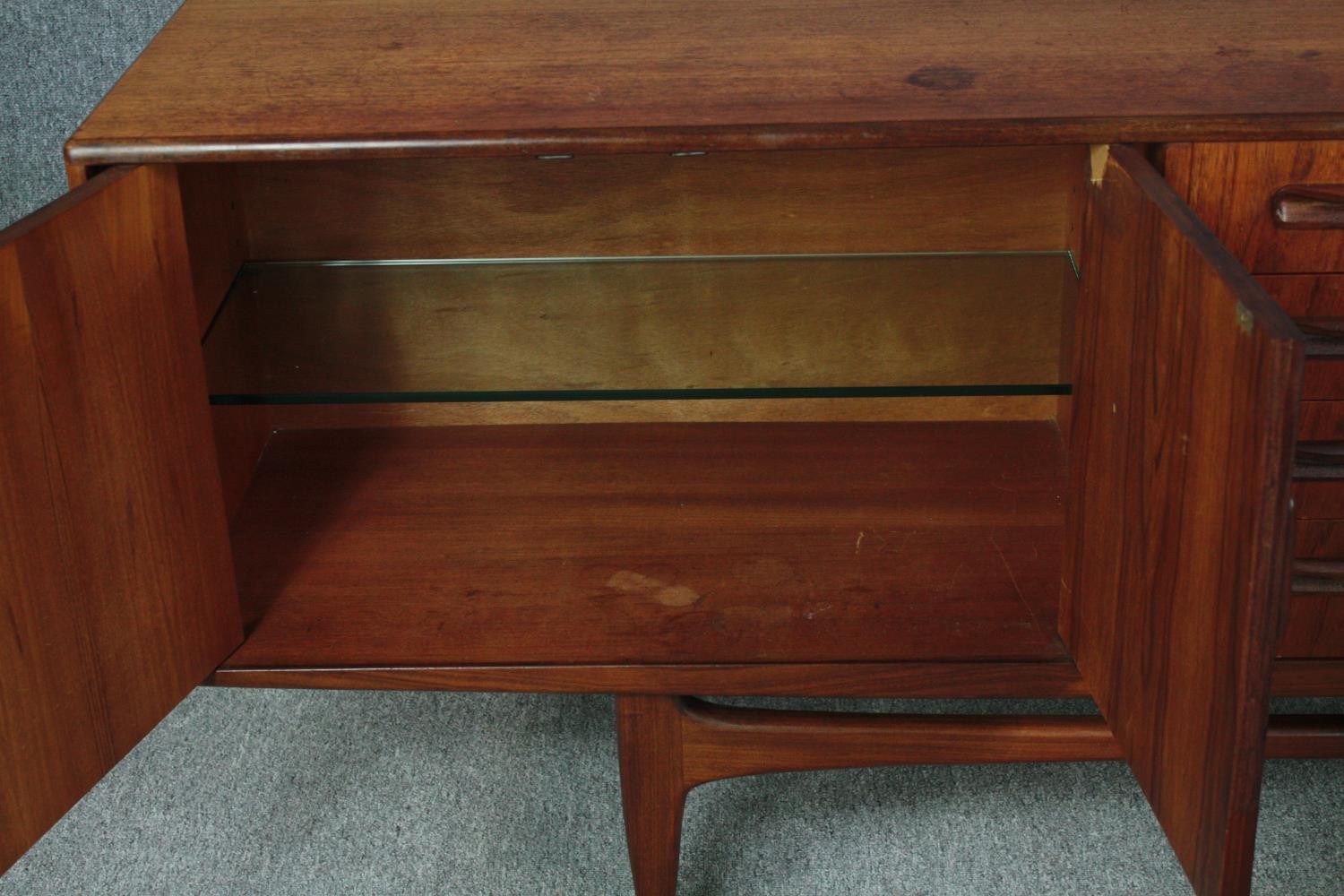 Sideboard, mid century teak by G-Plan with reinforced glass shelves. H.79 W.213 D.46cm. - Image 7 of 11