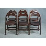 A set of six folding chairs from the Festival of Britain, each stamped to the underside.