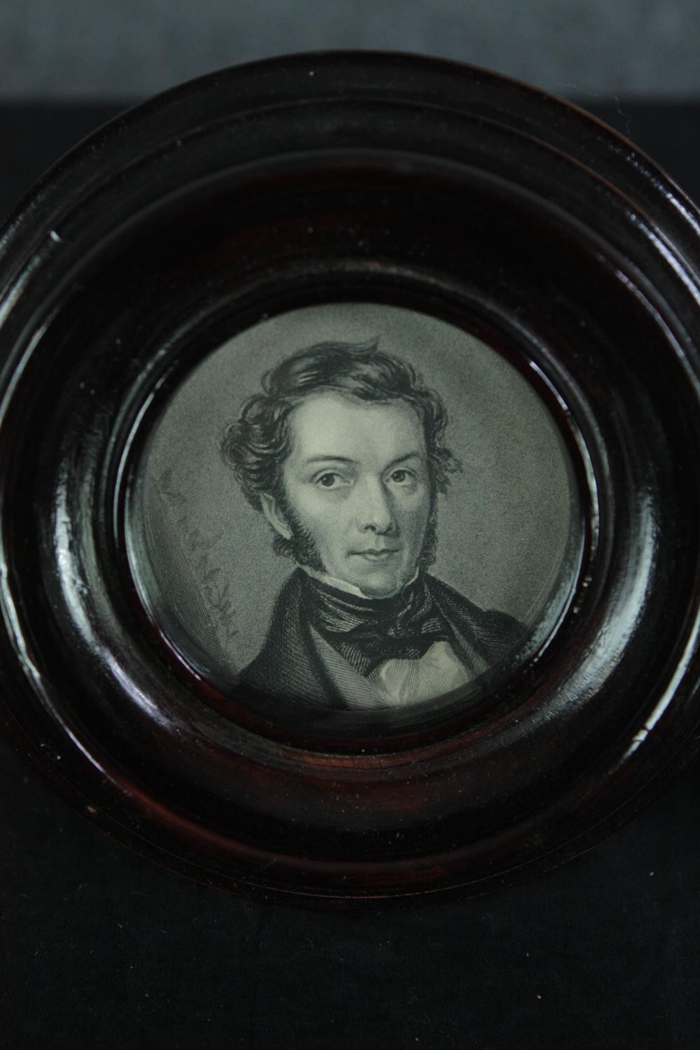 Two miniature printed portraits in ebonised frames. The gilt frame with a glass stand. H.14cm. ( - Image 2 of 5