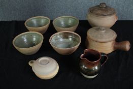A collection of eight pieces of glazed studio pottery, including six pieces by Bernard Leech. A