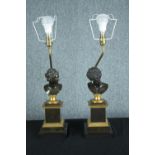 A pair of early 20th century neoclassical bronze busts on gilded plinths mounted desk lamps. H.60cm.