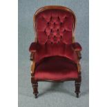 Library armchair, mid 19th century mahogany framed in deep buttoned upholstery. H.102cm.