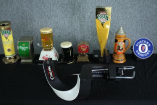 Beer fonts. Foster's, Guinness, Cobra and others. H.60cm. (largest)