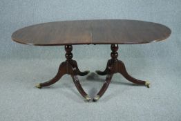 Dining table, Georgian style mahogany with an extra leaf. H.75 W.240 D.107cm. (extended).