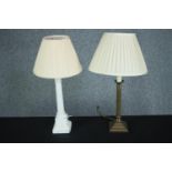 Two table lamps. Alabaster with a marble base and another brass example. Twentieth century. H.53 cm